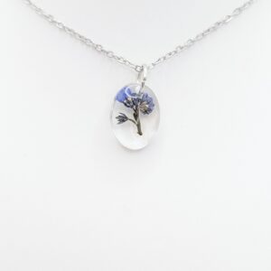 mały naszyjnik owalny kryształ z niezapominajką